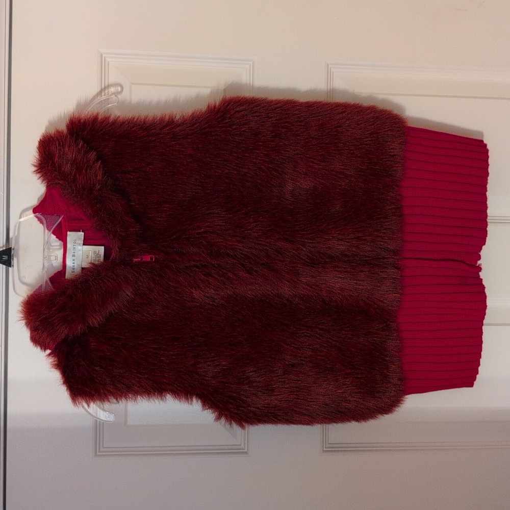 Sweater vest with hood